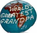 World greatest father or granpa written on a globe