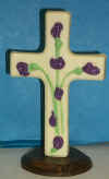 standing, 3 dimentional cross decorated with Calla Lillys
